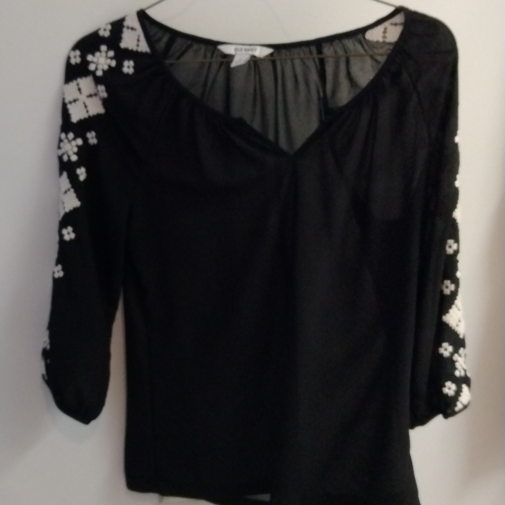 Old Navy black sheer top with white embroidery on sleeves.